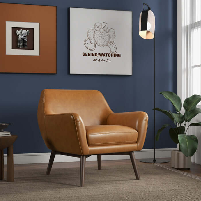 Panom MCM Tan Genuine Leather Lounge Chair in modern living room setting, showcasing mid-century style and comfort.