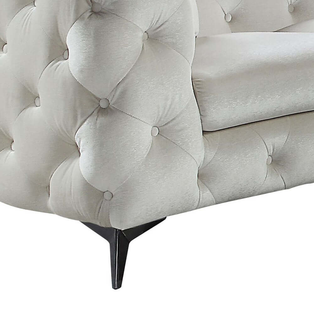 Atronia Beige Tufted Fabric Corner Sectional 133"L close-up of tufted detail and sleek black legs.