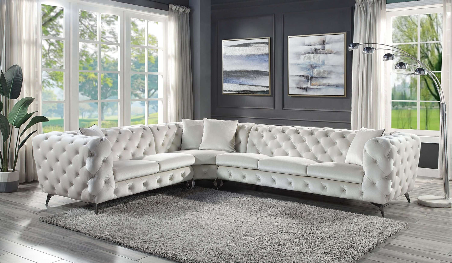 Beige Tufted Fabric Corner Sectional 133"L in modern living room with large windows and cozy decor.