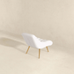 Aubrey Tufted Boucle Lounge Chair – Modern Armless Accent Chair (2 Colors) in white fabric with gold legs.