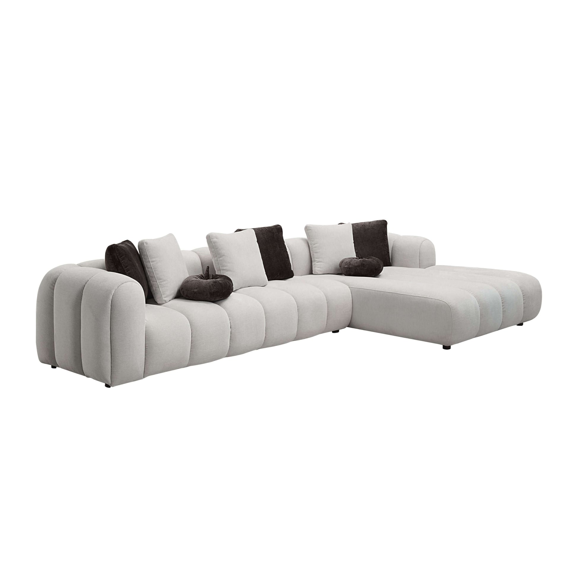 White sectional sofa w/ 8 pillows offers oversized comfort and modern elegance, perfect for any living room.