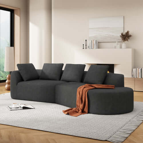 Modern Low Profile Modular Curved Foam Sofa 116' (4 Colors) in a stylish living room setting.