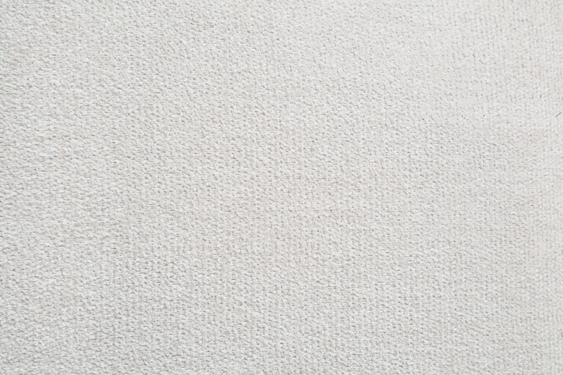 Textured white fabric upholstery suitable for a white sectional sofa.