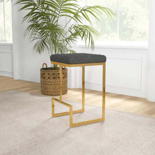 Joel Gold Velvet Bar Stool – Upholstered Backless Counter Stool with Metal Frame (Modern Glam Style) in a stylish setting.