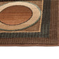 Detail of Leyden Rectangular Multicolor Chenille Area Rug with retro circular design and rich texture.