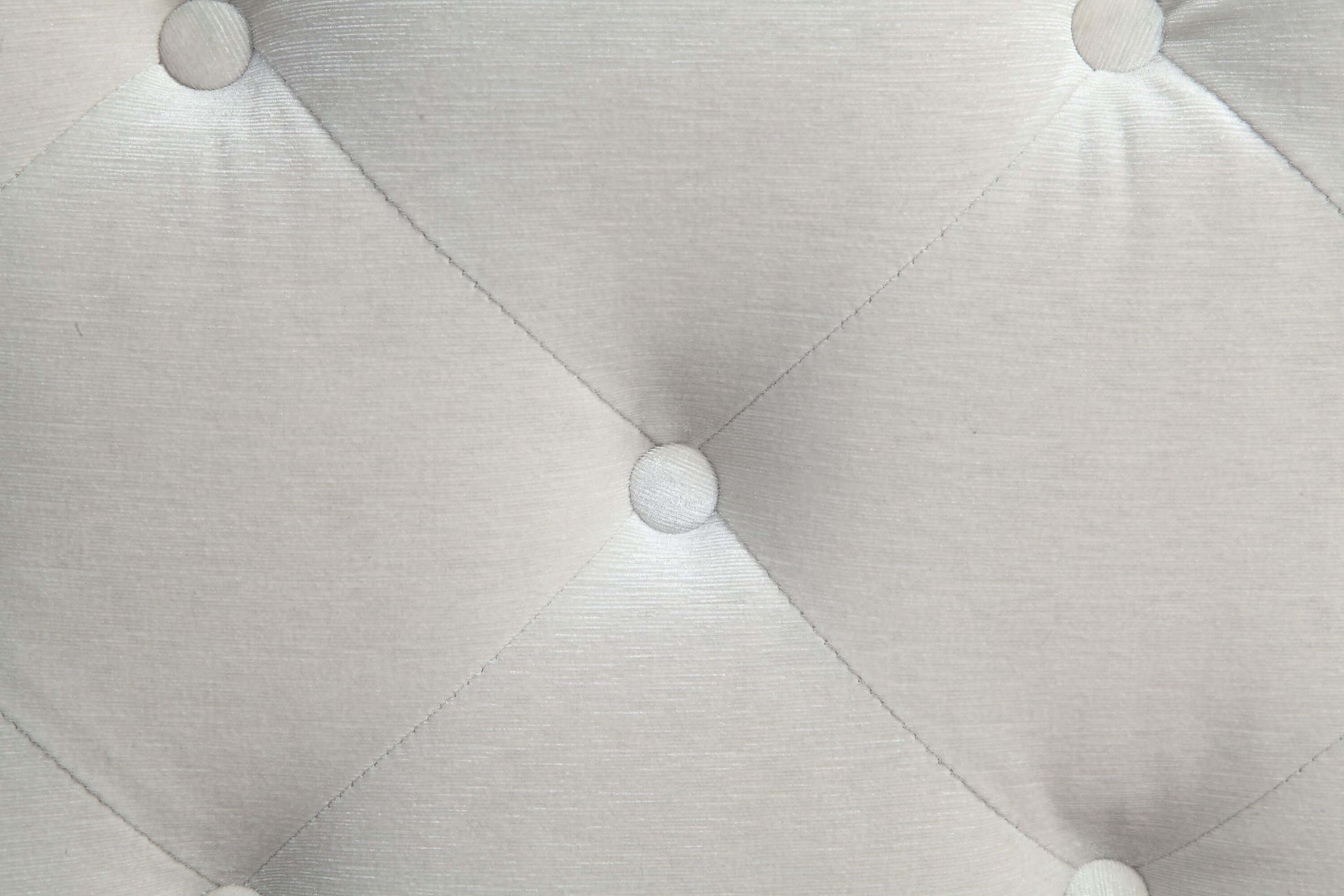 Close-up of the tufted fabric texture in the Atronia Beige Tufted Fabric Corner Sectional 133"L.
