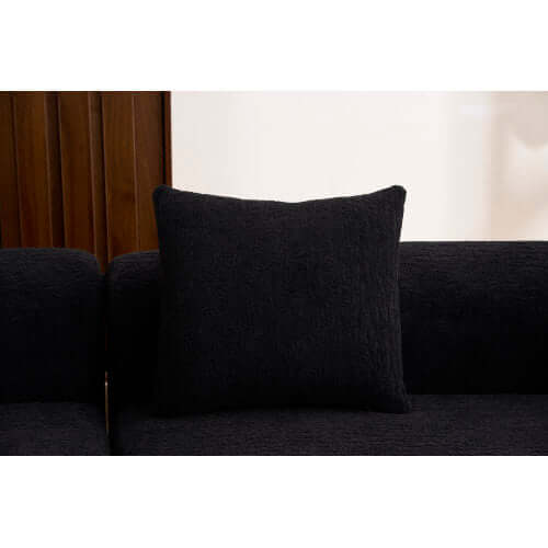 Curved Compression Foam Sectional Sofa – 110” Modular Chenille Couch (Sleeper Style) with a plush black cushion.