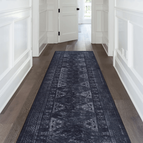 Black and gray washable rectangular area rug in a stylish hallway, ideal for high-traffic spaces.