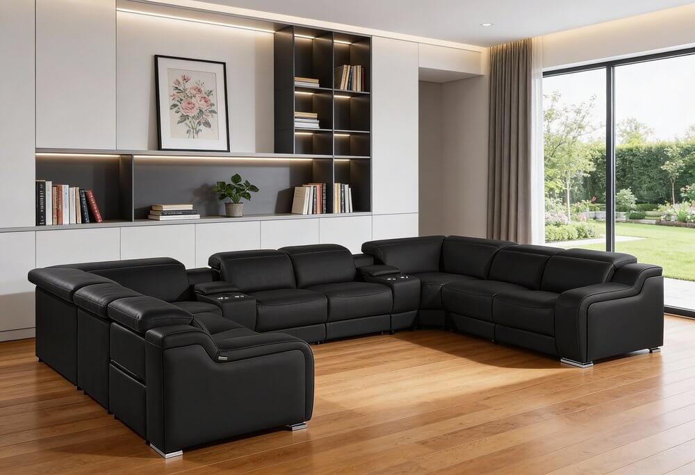 Black Italian Leather Power Reclining U Shaped Ten Piece Corner Sectional With Console in modern living room setting.