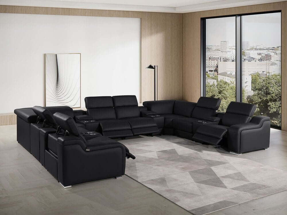 Black Italian Leather Power Reclining U Shaped Twelve Piece Corner Sectional With Console in modern living room setting.