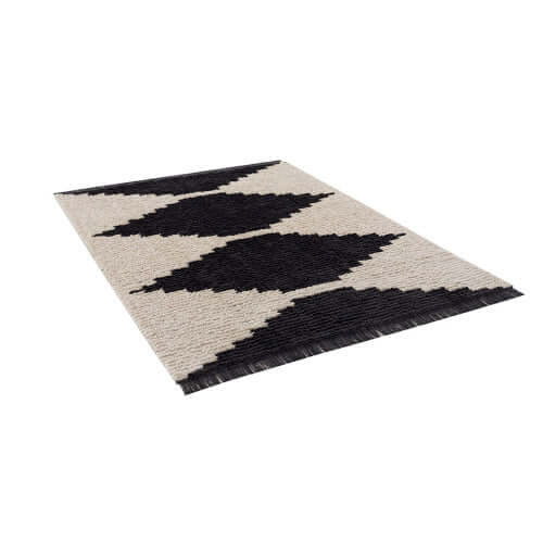 Black & ivory modern diamond design area rug, 6' x 9', stylish and plush for contemporary home decor.