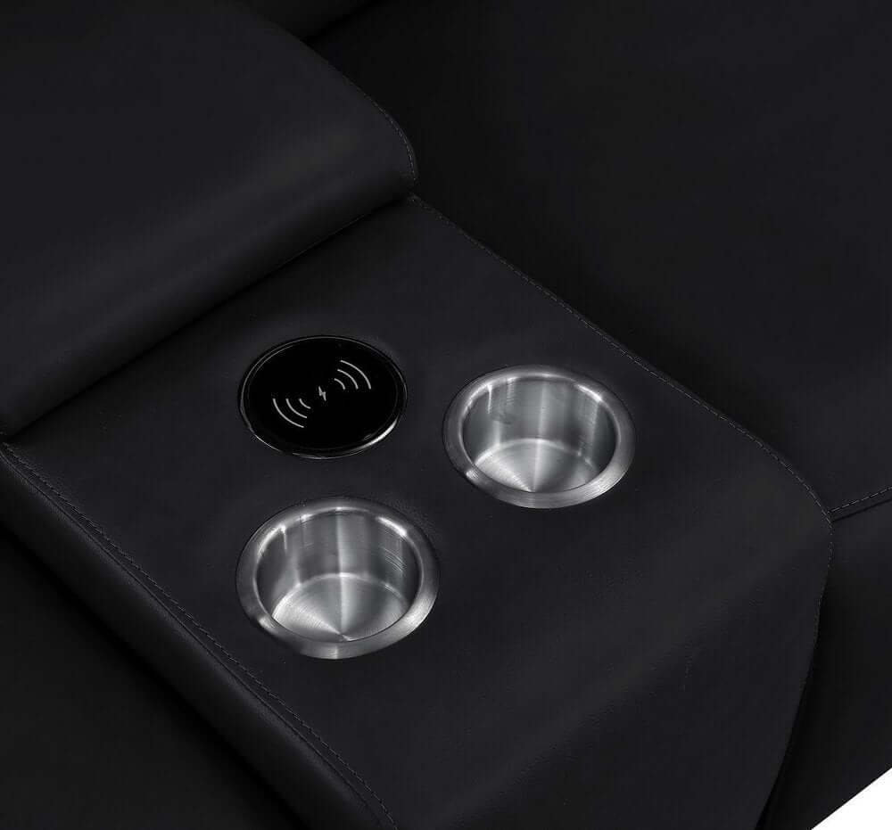 Close-up of the cup holders and charging port on the Black Leather Modular U Shaped Eight Piece Corner Sectional With Console.