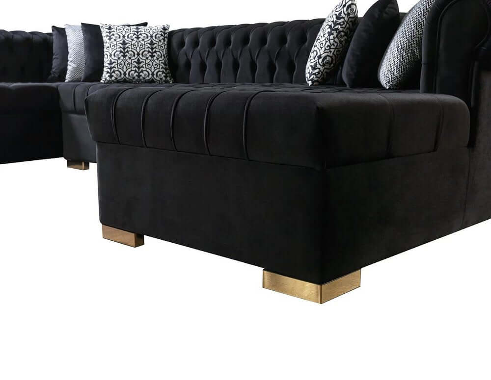 Black Velvet U Shaped Three Piece Sofa and Chaise Sectional With Toss Pillows with tufted design and accent pillows.
