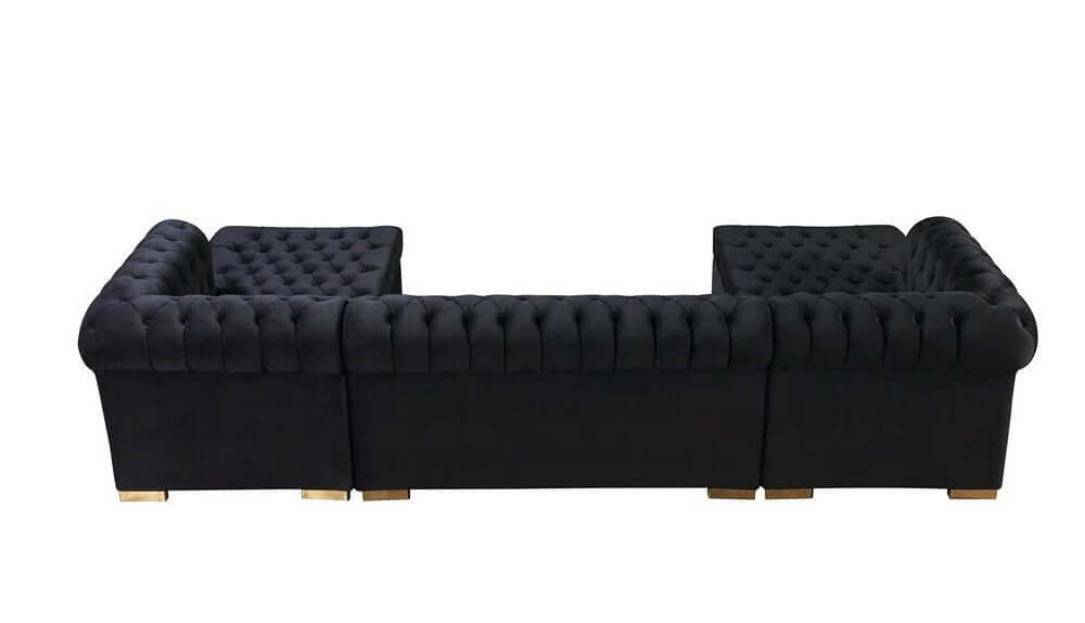 Black Velvet U Shaped Three Piece Sofa and Chaise Sectional With Toss Pillows from a side view, showcasing tufted design.