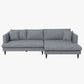The Blake Velvet Upholstered L-Shape Chaise Sofa Sectional 107 by Ashcroft Furniture features plush gray velvet, wooden legs, three back cushions, and two matching throw pillows, shown against a plain white background.