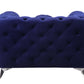 Atronia Luxe Deco Blue Tufted Velvet Armchair 41"W showcasing its plush sapphire velvet and elegant tufted design.