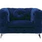 Atronia Luxe Deco Blue Tufted Velvet Armchair 41"W featuring plush sapphire velvet upholstery and stylish high-shelter arms.
