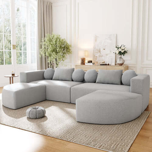 Boneless Boucle Modular Sectional Sofa 115” – Deep Seat Curved U-Shaped Foam Couch for 6 in a modern living room setting.