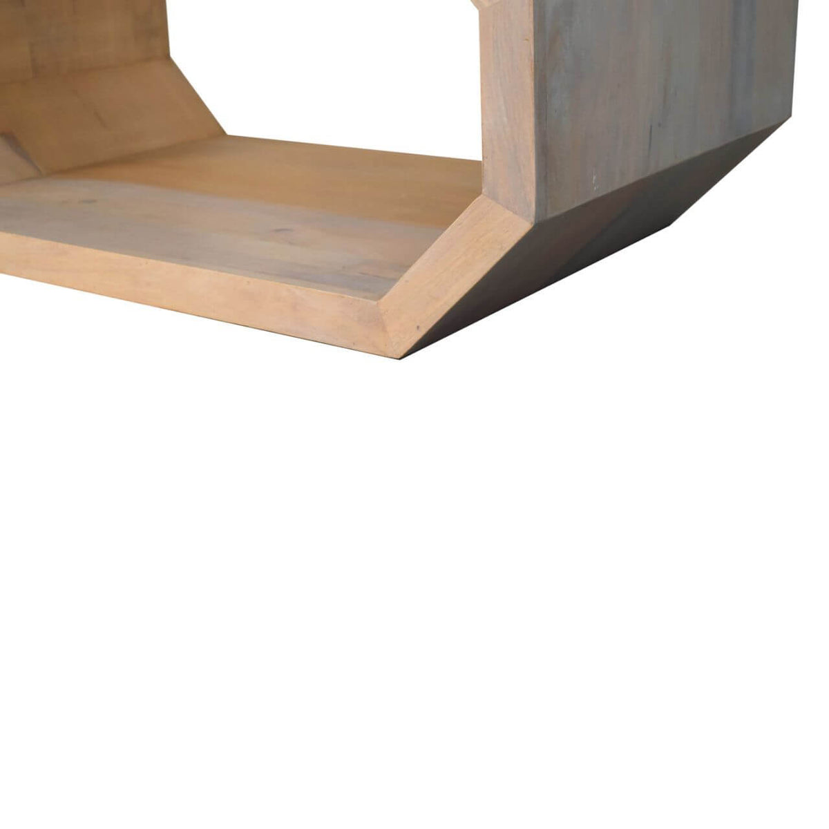 Close-up of the solid wood hexagonal coffee table showcasing its unique geometric design and durable construction.