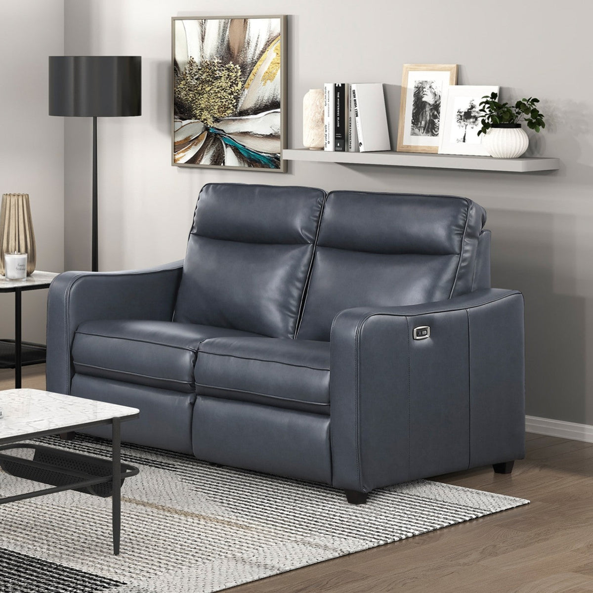 Haddon power reclining sofa and loveseat set in navy faux leather