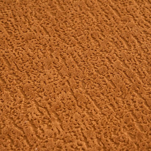 Close-up of soft chenille fabric in warm brown, showcasing its textured surface suitable for modern upholstery.