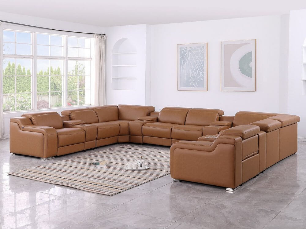 Chestnut Italian Leather Power Reclining U Shaped Twelve Piece Corner Sectional With Console in a modern living room.