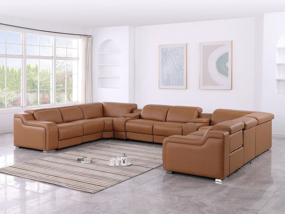 Chestnut Italian Leather Power Reclining U Shaped ten Piece Corner Sectional With Console in a stylish living room.