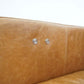 Detail of Christopher MCM Leather Power Reclining Sofa 93" – Mid-Century Modern Recliner Couch showing leather texture and button.