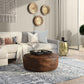 Connor Brown Buffalo Leather Ottoman 34" – Round Top-Grain Leather Pouf in a stylish living room setting