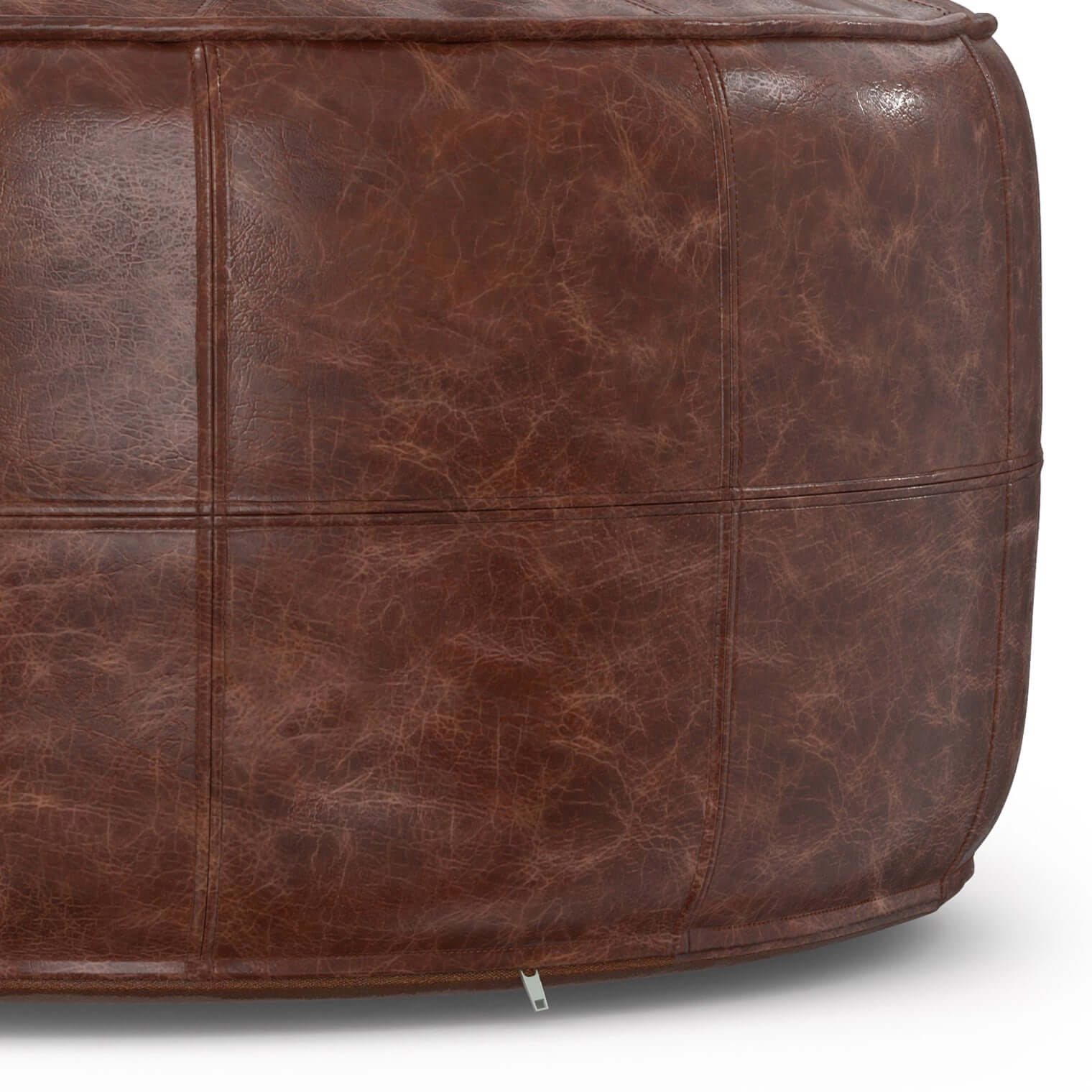 Connor Brown Buffalo Leather Ottoman 34" – Round Top-Grain Leather Pouf with a textured brown finish.