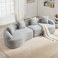 Curved Compression Foam Sectional Sofa – 110” Modular Chenille Couch (Sleeper Style) in soft gray upholstery with pillows.
