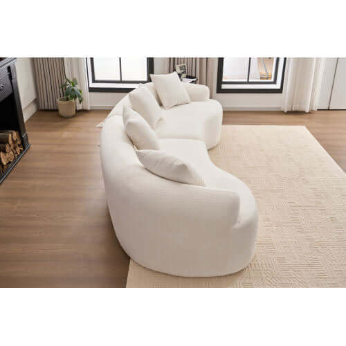 Curved Compression Foam Sectional Sofa – 110” Modular Chenille Couch (Sleeper Style) in a stylish living room setting.
