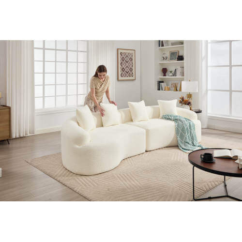Curved Compression Foam Sectional Sofa – 110” Modular Chenille Couch (Sleeper Style) in a cozy living room setting.