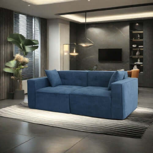 Modern low profile blue memory foam sofa in contemporary living room setting.