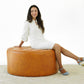 Seletar Round Button Tufted Leather Ottoman – 37” Genuine Leather Ottoman (MCM Style, Multi-Functional) with a model.