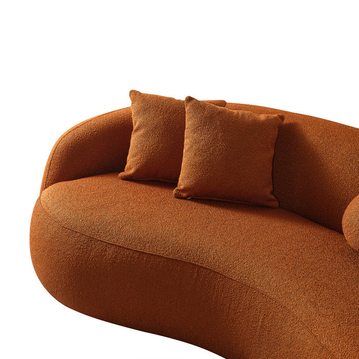 Modern Boucle Upholstered Curved Japandi Sofa 89” – Sculptural Minimalist Couch with soft orange fabric and pillows.