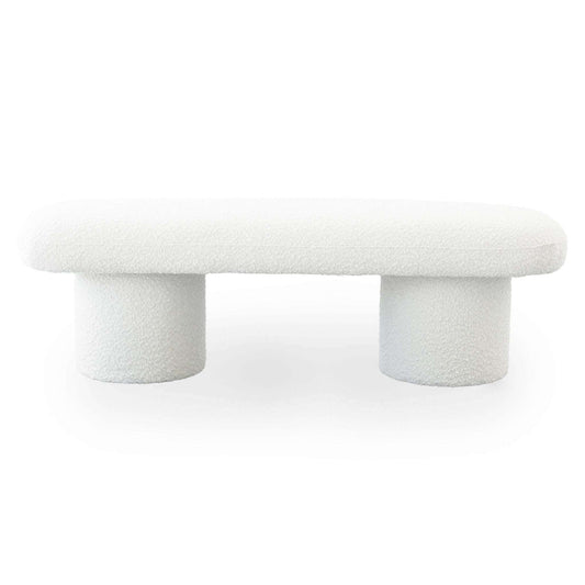 Randolph Ivory Boucle Bench 56' in modern living room with minimalist design and sleek cylindrical legs.