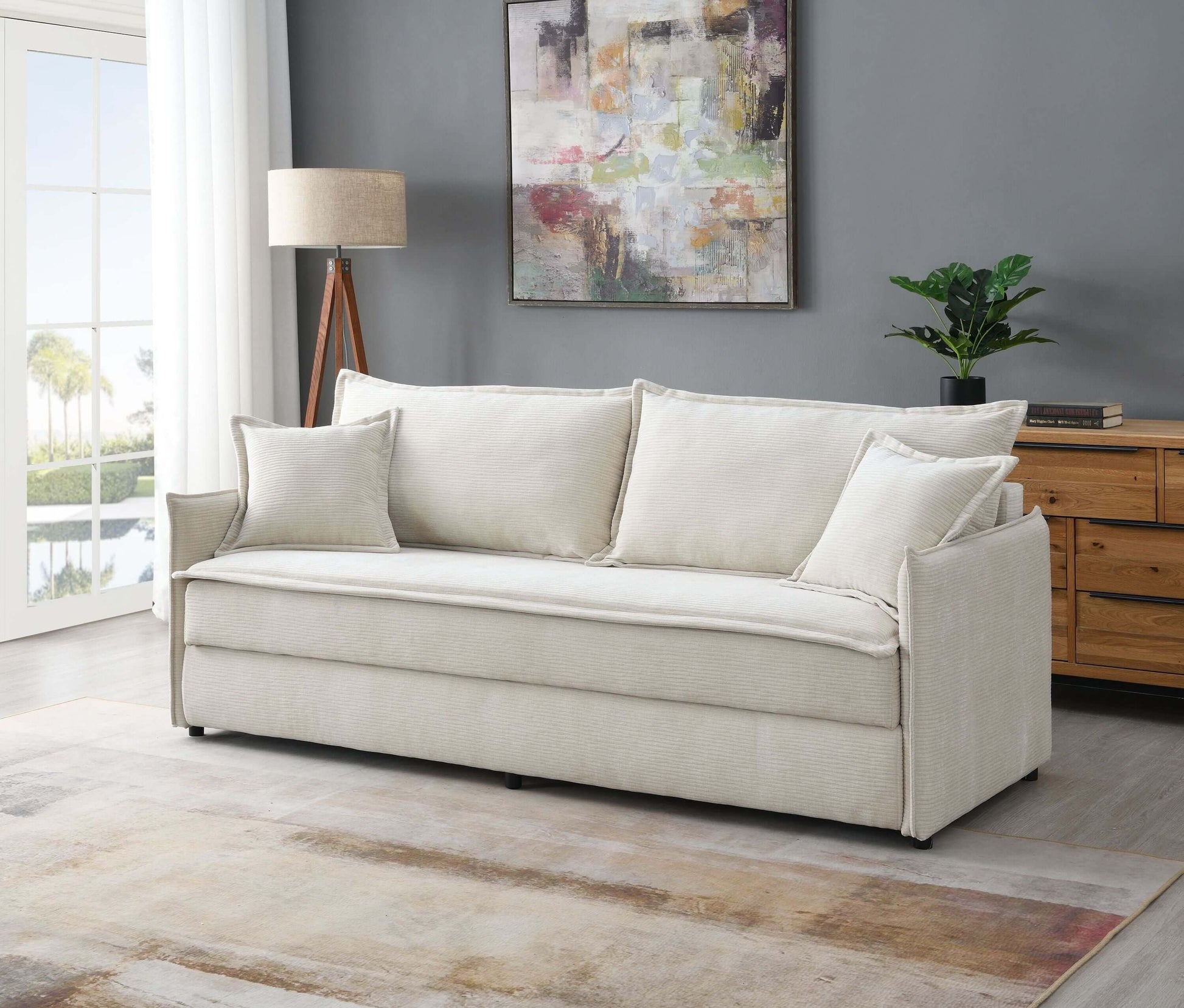 Elisea Fabric Sleeper Sectional – 81” Beige Pull-Out Sofa Bed with Storage in stylish living room setting.