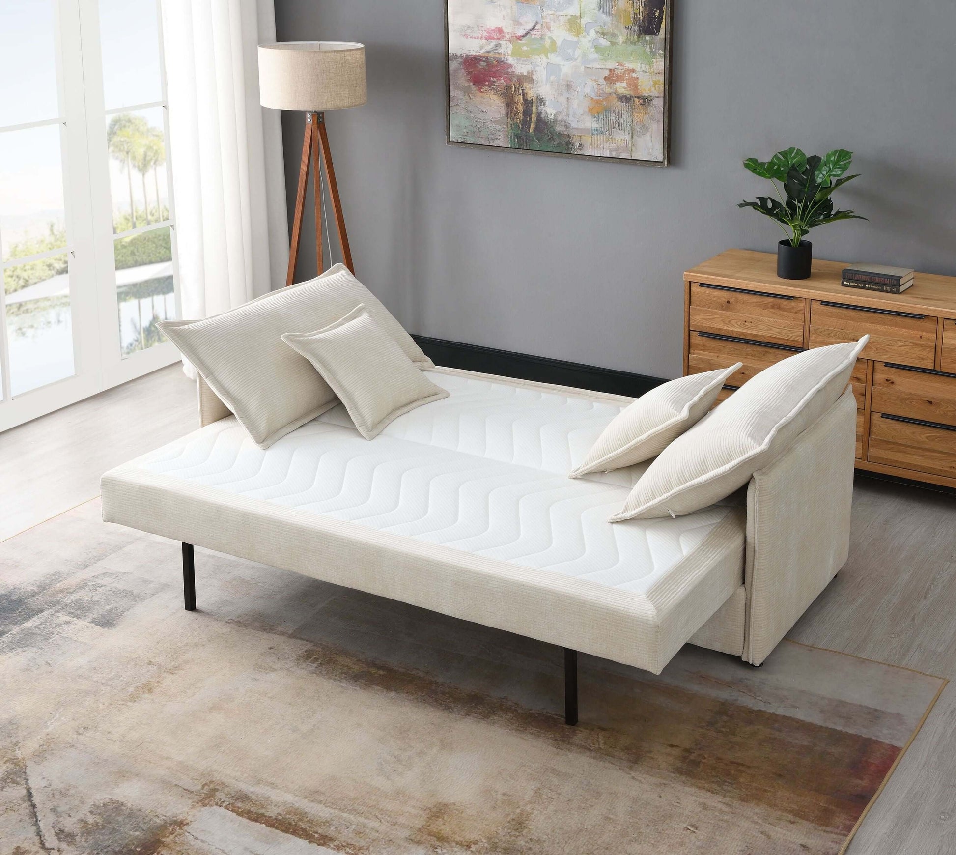 Elisea Fabric Sleeper Sectional – 81” Beige Pull-Out Sofa Bed with Storage in a stylish living room setting.