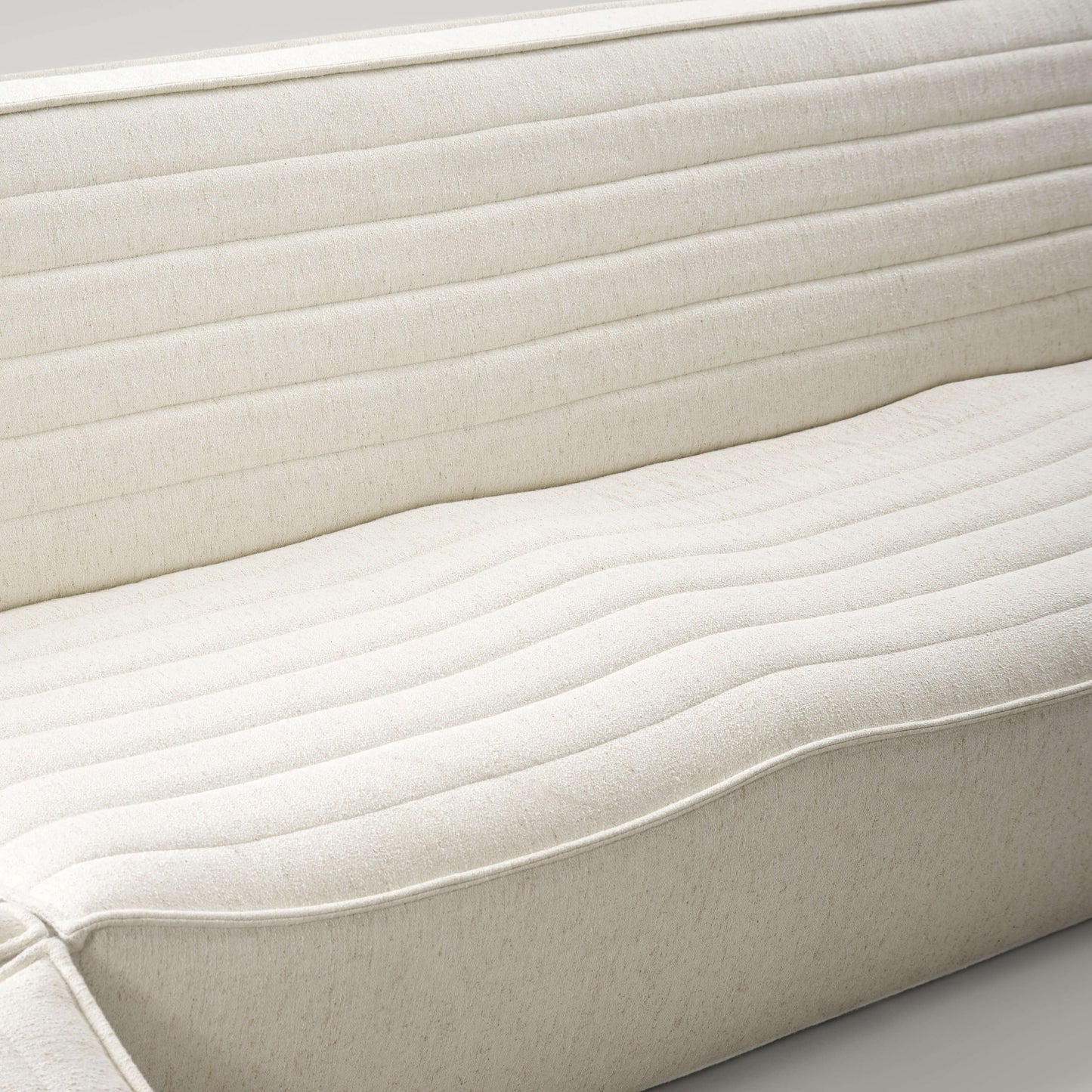 Close-up of the soft, breathable fabric of the Evelyn Harmony Corner Sofa's comfortable backrest.