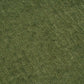 Textured green chenille fabric background, suitable for upholstery and home decor.