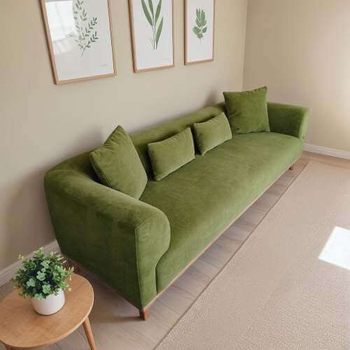 Richardson Velvet Sofa 103” - Scandinavian Modern 3-Seat Sofa with Wood Base in a cozy living room setting.