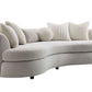 Iniko Bouclé Sofa – 105” Beige Curved Sofa with 6 Pillows (Modern Statement Couch) with soft, textured fabric and pillows.