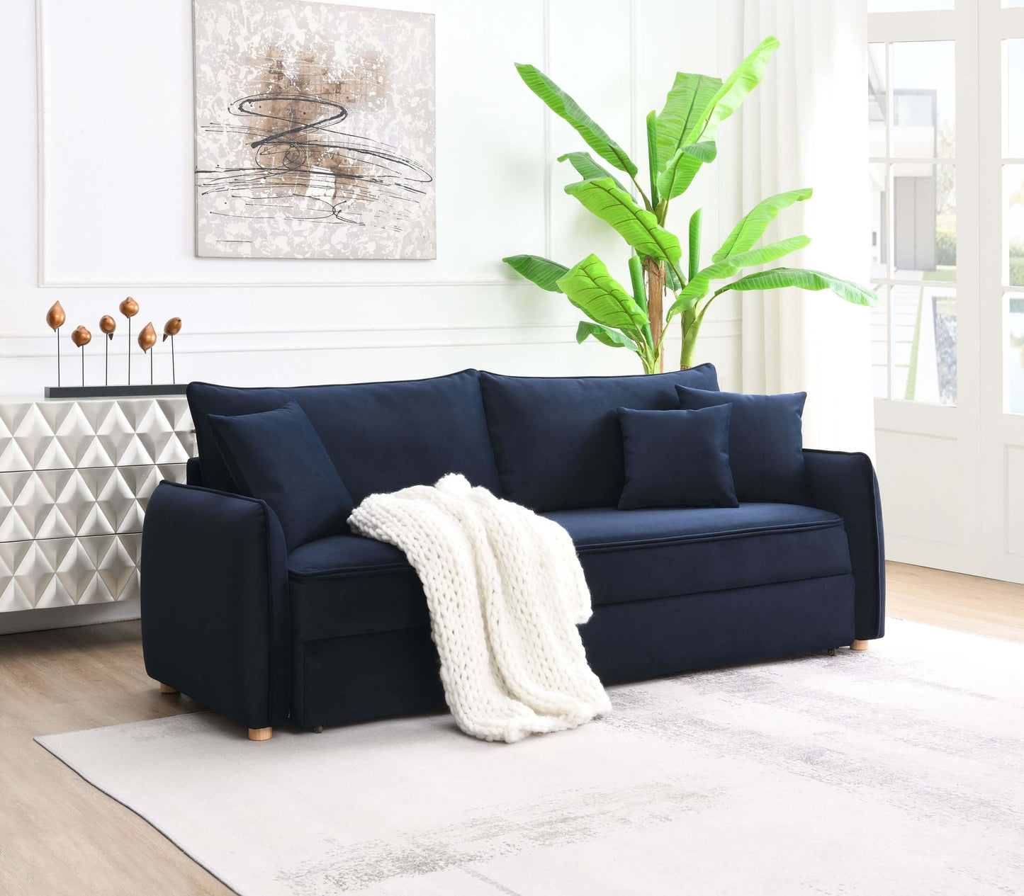 Irina Blue Velvet Sleeper Sofa w/ 3 Pillows – 88" Velvet Storage Sleeper Couch in modern living room setting.