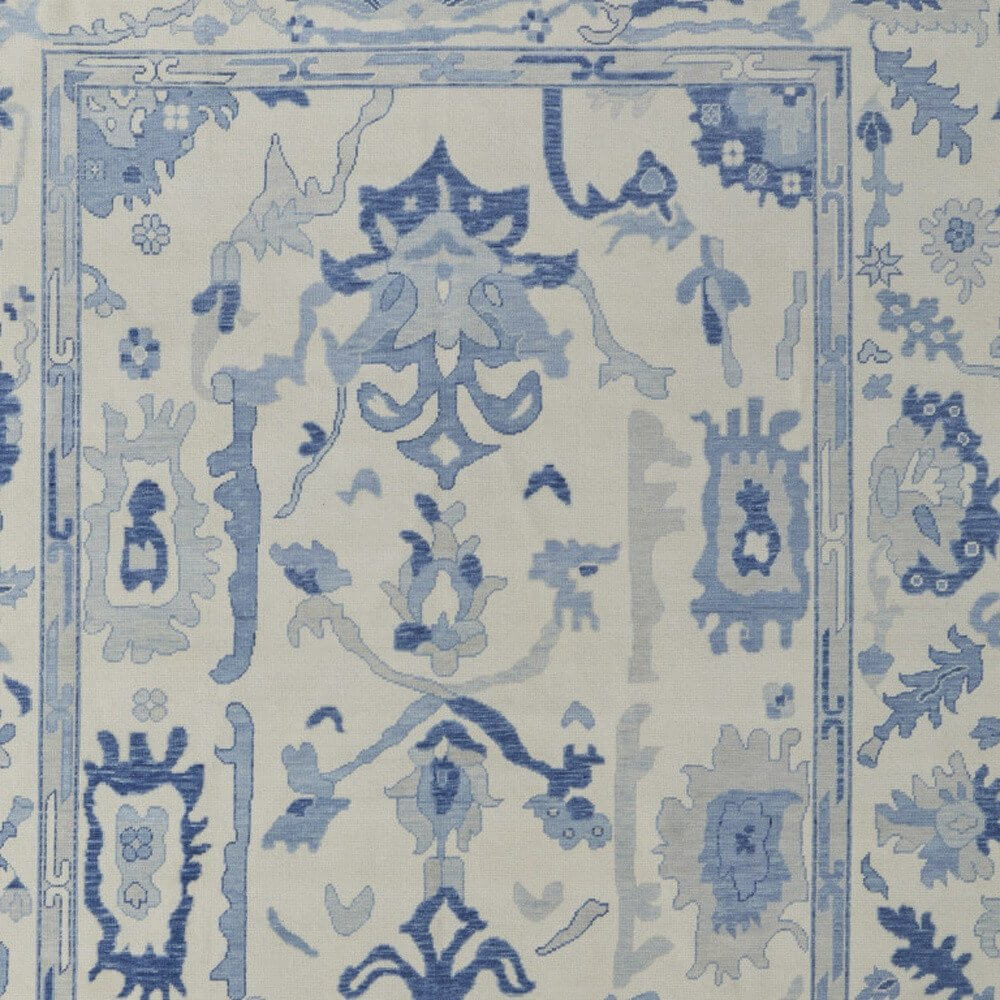 Ivory and Blue Wool Floral Hand Knotted Area Rug With Fringe Area Rug | 9' x 13' detailed pattern in soft blue tones.
