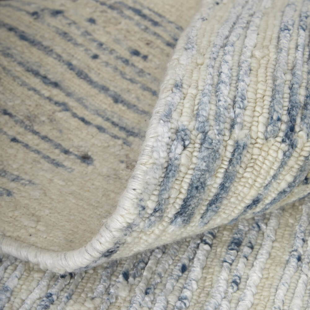 Ivory Blue And Silver Abstract Hand Knotted Distressed Area Rug | 9' x 13' showing detailed texture and color patterns.