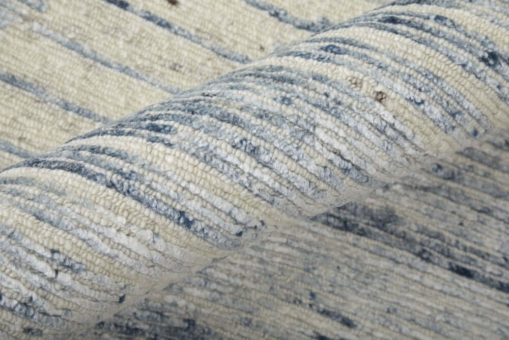 Ivory Blue And Silver Abstract Hand Knotted Distressed Area Rug | 9' x 13' close-up showing texture and detail.