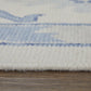 Ivory and Blue Wool Floral Hand Knotted Area Rug With Fringe Area Rug | 9' x 13'. Close-up detail of soft wool texture.