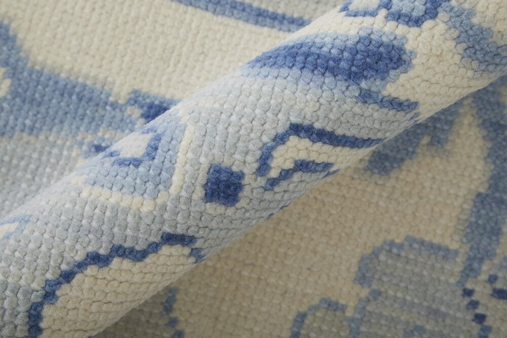 Ivory and Blue Wool Floral Hand Knotted Area Rug With Fringe Area Rug | 9' x 13' close-up detail of soft pattern