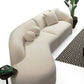 Ivory Boucle Curved Modular Sectional Sofa with Chaise & Toss Pillows | Modern 2-Piece Sectional in a cozy living room setting.